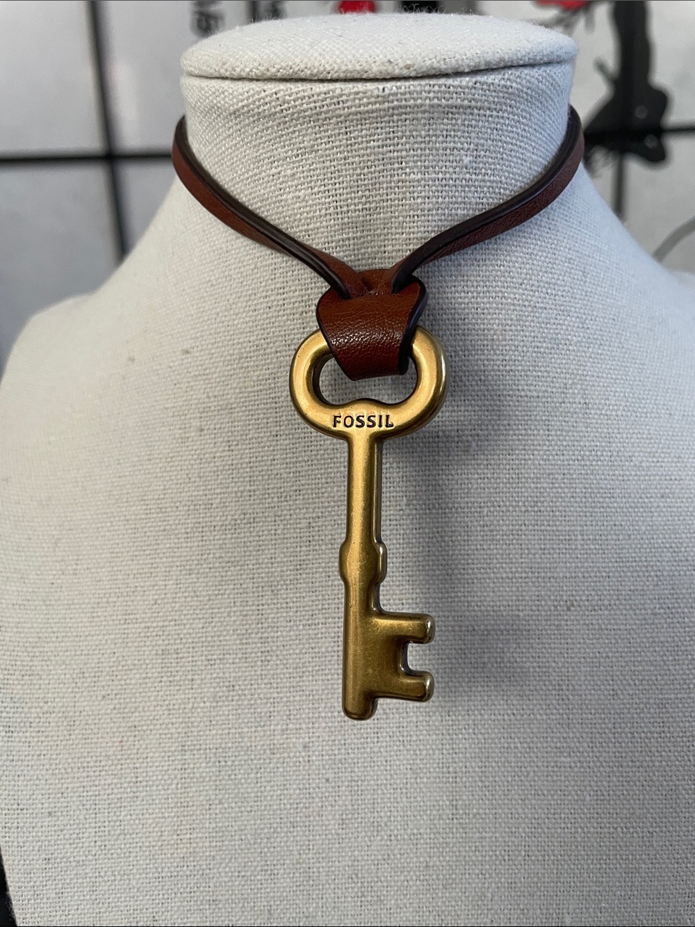 Fossil Key Pendant Hangtag